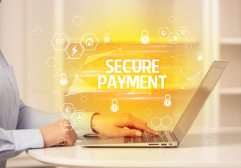 SECURE PAYMENT inscription on laptop, internet security and data protection concept, blockchain and...