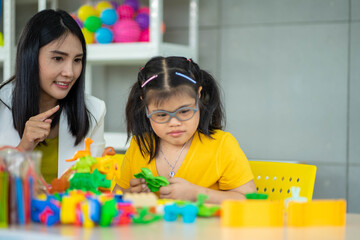 disability kid on wheelchair with Autism child in special classroom new normal learning education 