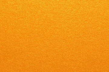 Texture of gold shiny metallic paper