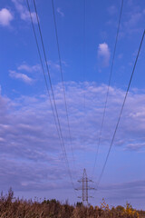 high-voltage lines against the sky