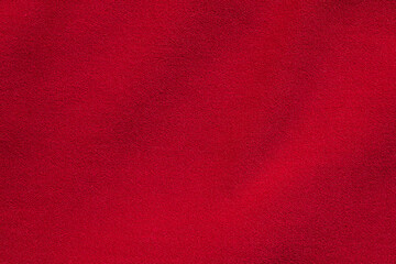 Red fabric cloth texture background close up