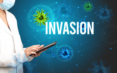doctor prescribes a prescription with INVASION inscription, pandemic concept