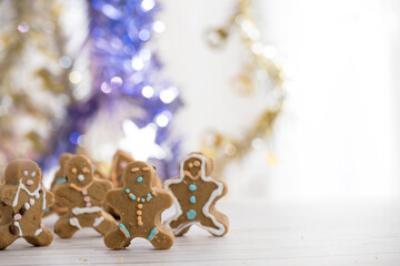 Gingerbread man cookies with bokeh background and copy space.