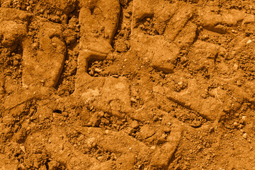 close up of tire print on the ground
