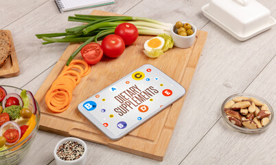 Healthy Tablet Pc compostion with DIETARY SUPPLEMENTS inscription, weight loss concept