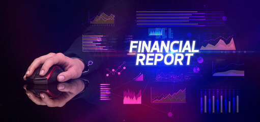 hand holding wireless peripheral with FINANCIAL REPORT inscription, cyber business concept