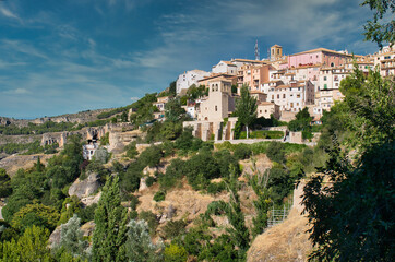 Fototapeta na wymiar View of the upper city of Cuenca, Castilla la Mancha, with its houses on the side of a hill