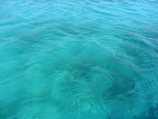 The white sandy beaches and turquoise ocean water on the coastal landscapes of Sal and Boa Vista in the Cape Verde Islands in the Atlantic, West Africa