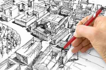 Planning a new city - Engineer-architect drawing with a pencil a sketch of a new modern imaginary...