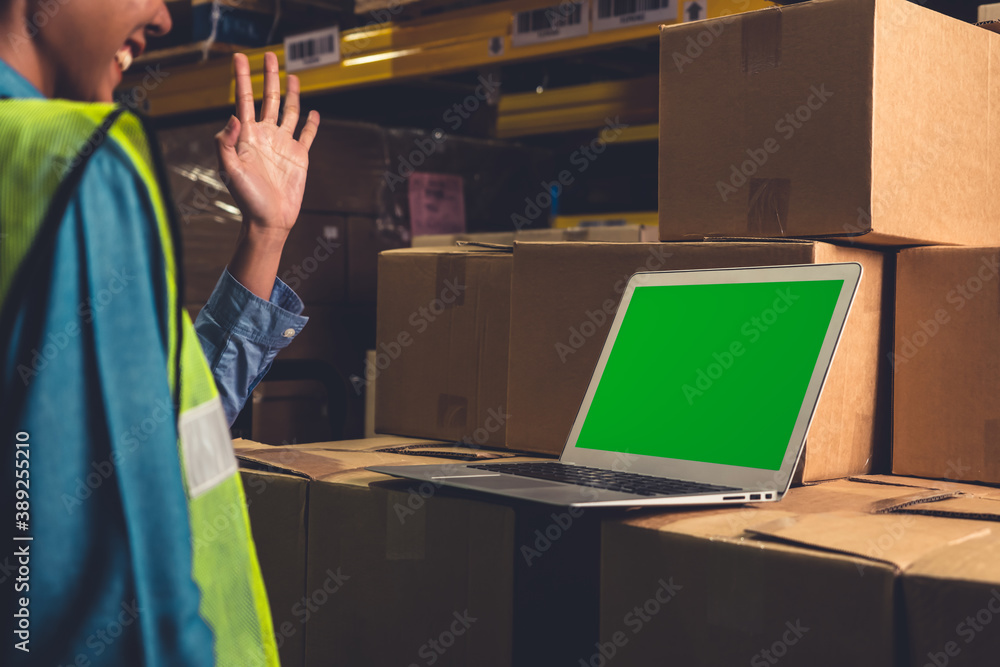 Poster computer with green screen display in warehouse storage room . delivery and transportation software 
