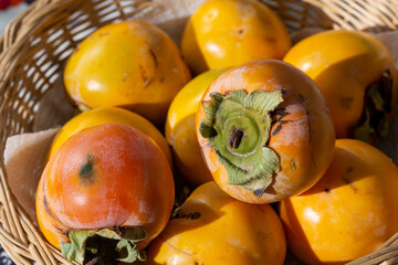 Autumn Fruits: Basket of Persimmons