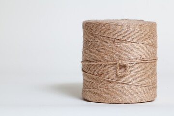 Roll of twine on white background
