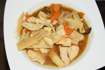 Cooked Chicken in the Plate With vegetables