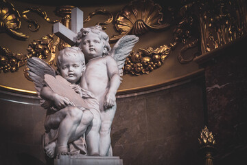 BUDAPEST, HUNGARY - JULY 15, 2019: St. Stephen's Basilica, interior. Baby Angel Statues.