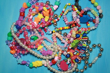 Colored decorative beads on a glass transparent saucer