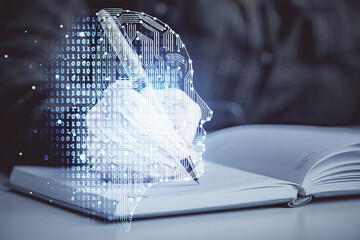 Multi exposure of woman's writing hand on background with brain hologram. Concept of brainstorming.