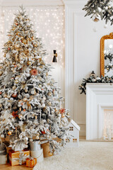 Beautiful festively decorated room with a Christmas tree. Cozy bright living room with stylish...
