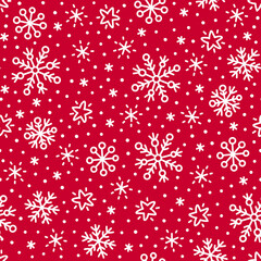 White snowflakes on red background Christmas seamless pattern.