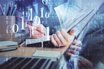 Fototapeta premium Double exposure of writing hand on background with data technology hologram. Big data concept.