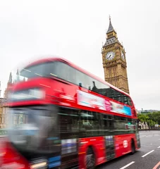 Foto auf Glas Big Ben and red bus in motion in London © Wieslaw