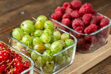 Assorted berries of raspberries, gooseberries and red currants