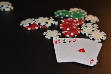 Poker concept with winning hand of 4 aces