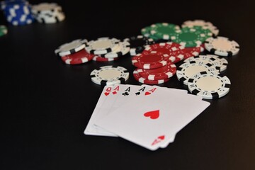 Poker concept with winning hand of 4 aces