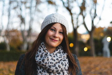 Girl smiling wearing a cup in winter 2020. Autumn 2020 woman women wearing a cap