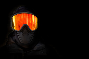 Portrait of a snowboarder with black background