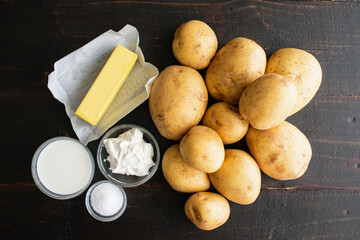 Ingredients for Mashed Potatoes: Yukon Gold potatoes, butter, milk, and other ingredients for a...