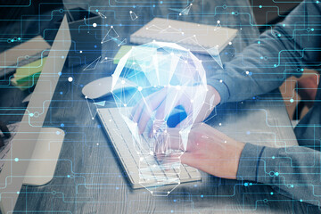 Growing arrows with businessman working on computer on background. Success concept. Double exposure.