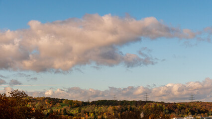 Fototapeta premium big grey cloud on the sky on a sunny day