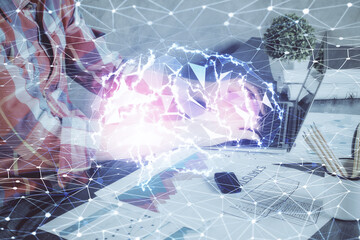 Man with computer background with brain theme hologram. Concept of brainstorm. Double exposure.