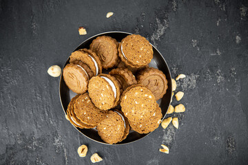 Fresh made Hazelnut Cream Cookies (close up; selective focus)