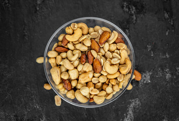 Portion of roasted nuts (close up; selective focus)