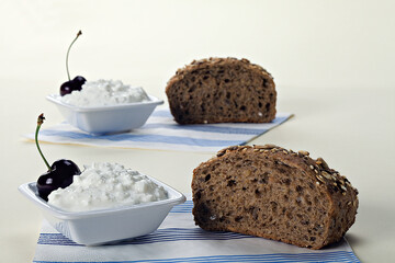 Nice and light breakfast. Loaf of bread and white cheese.