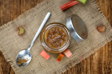 Portion of homemade Rhubarb Jam (close up; selective focus)