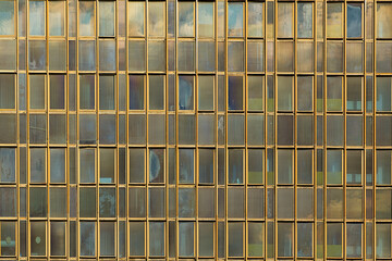 Blue and yellow windows. Shape and color abstract.