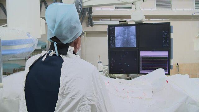 GRODNO, BELARUS - MAY 02, 2018: Head of the angiography Department of the HRODNA regional clinical hospital Leonid Frantsevich Vasilchuk conducts a high-tech type of medical care.