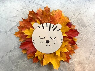 lion of autumn , maple leaves, children's crafts