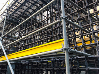 Metal reinforcement framework and scaffoldings at construction site