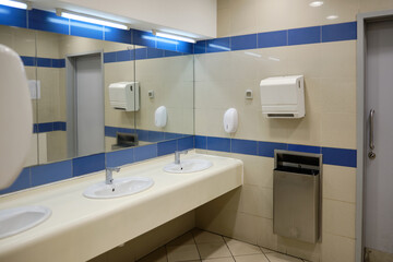 Washbasins and hand dryers in the public toilet
