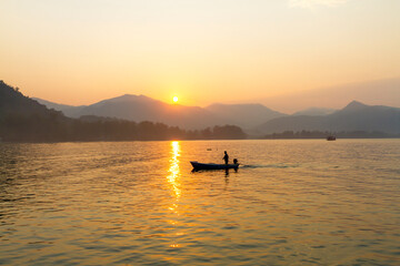 Sunrise in the morning and fisherman