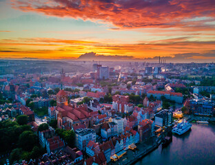 Naklejka premium Aerial sunset view of the amazing old town and rivers of Gdansk with ships