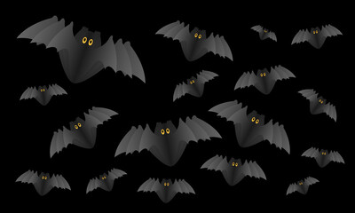 Halloween paper bats on a black background