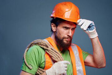 Man in working uniform construction industry cropped view