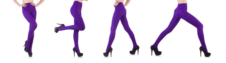 Woman legs wearing long stockings isolated on white