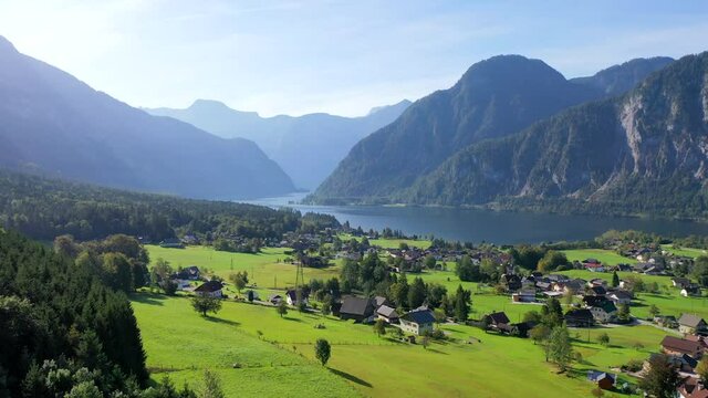 Aerial Drone Movie Flying over the famous town Hallstatt in Salzkammergut, Upper Austria. Aerial view from above. 4K