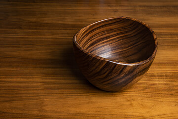 Wooden bowl on a table