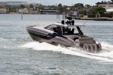 High-end motor boat cruising the Florida Intra-Coastal Waterway .